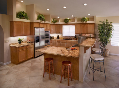  Betularie granite countertop and brown shaker cabinets